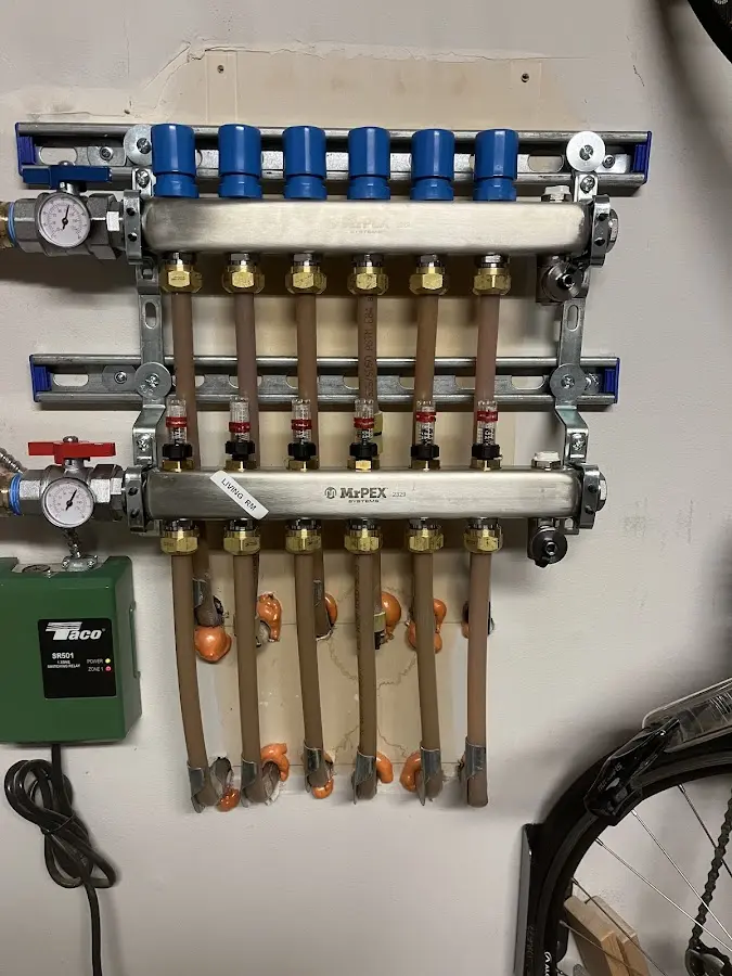 Plumber performing Leak Detection at a residential property in Escatawpa